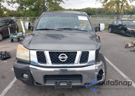 2011 Nissan Titan Sl z USA, uszkodzony, nr VIN 1N6AA0EC0BN318840